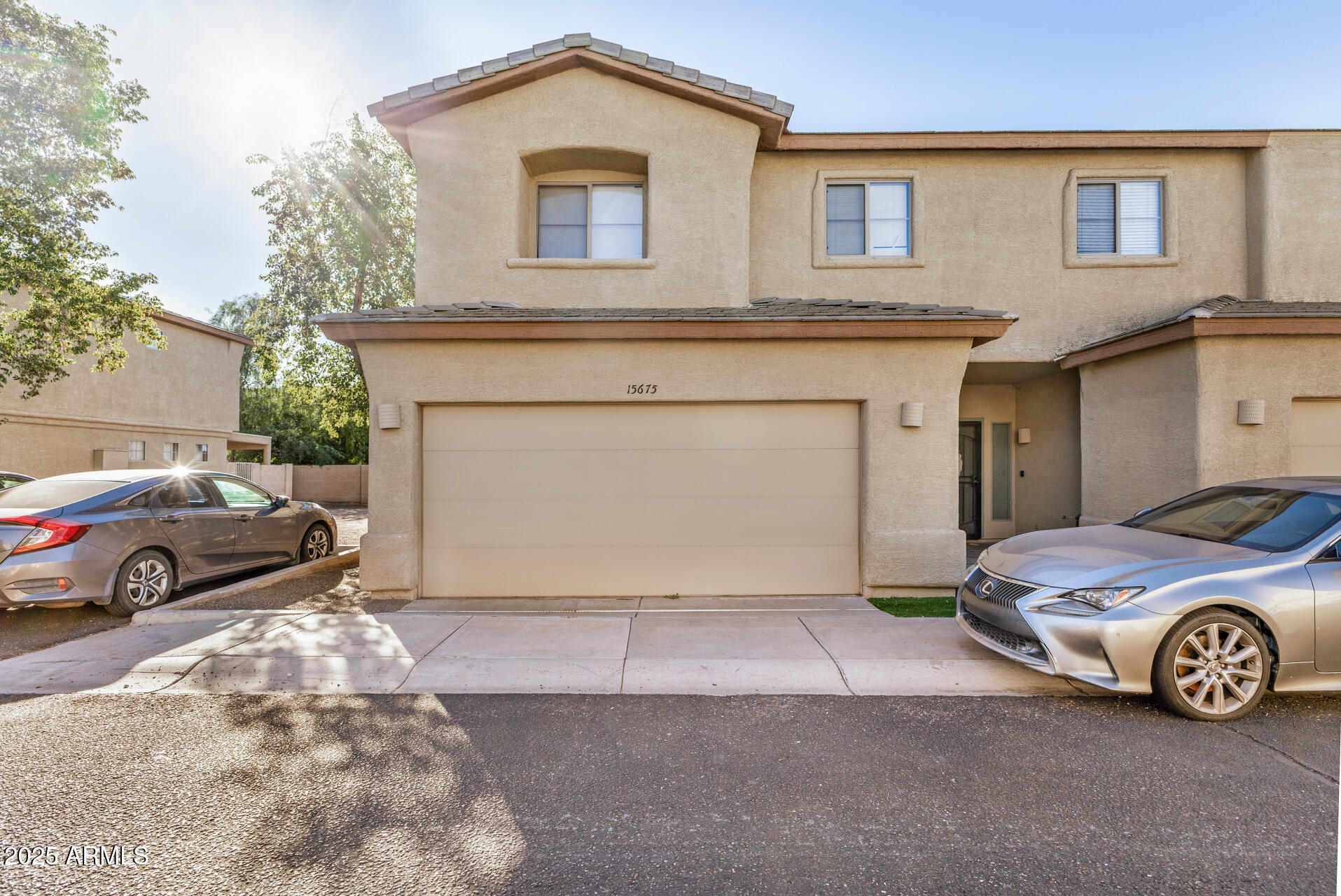 a car parked in front of a house