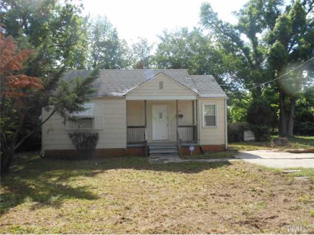 813 Colleton Road Raleigh, NC 27610 - Photo 1 of 4 a front view of a house with a yard