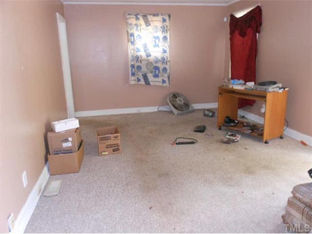 813 Colleton Road Raleigh, NC 27610 - Photo 4 of 4 wooden floor with table and chairs