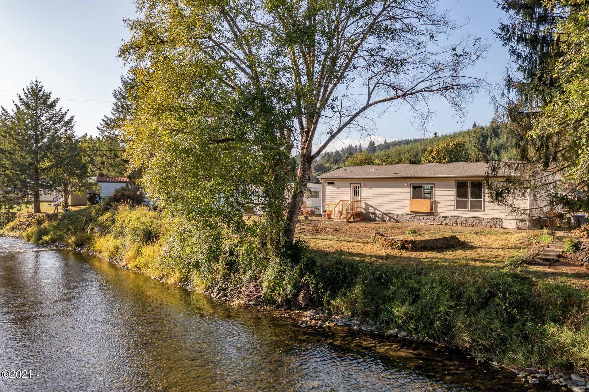 940 North River Bend Road Otis, OR 97368 - Photo 24 of 31 Backyard from River
