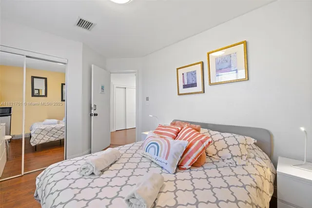 a view of livingroom with furniture and hardwood floor