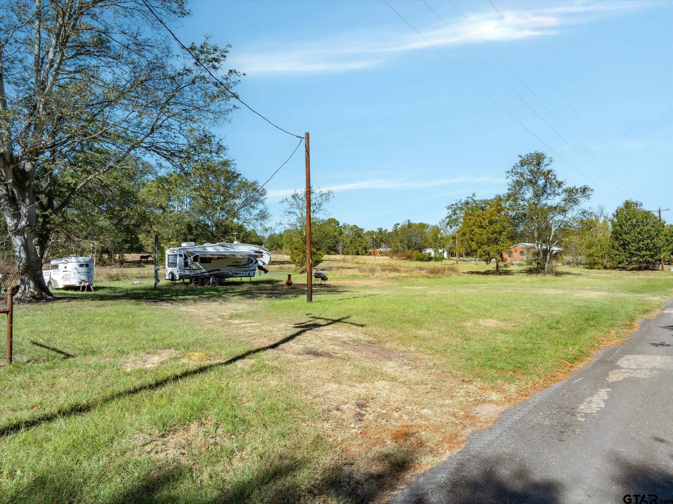 21151 C R 4106 Lindale, TX 75771 - Photo 3 of 12 a view of a park with large trees