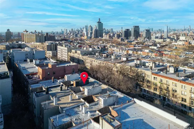 a bathroom with a window and a white door