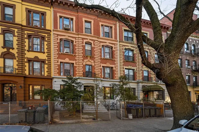 a bathroom with a glass door shower