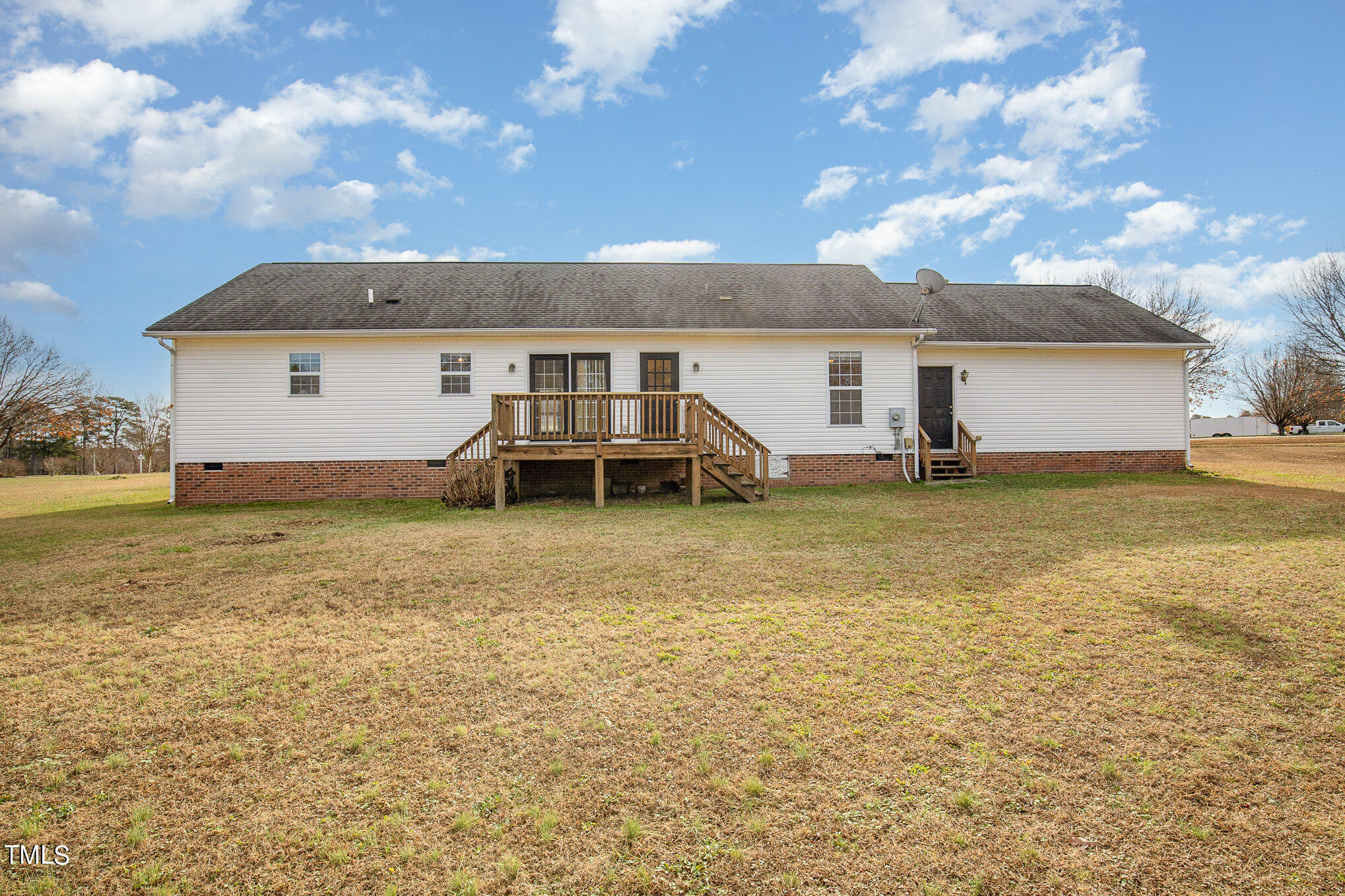 424 Henry Baker Road Zebulon, NC 27597 - Photo 21 of 26 a view of a house with a yard