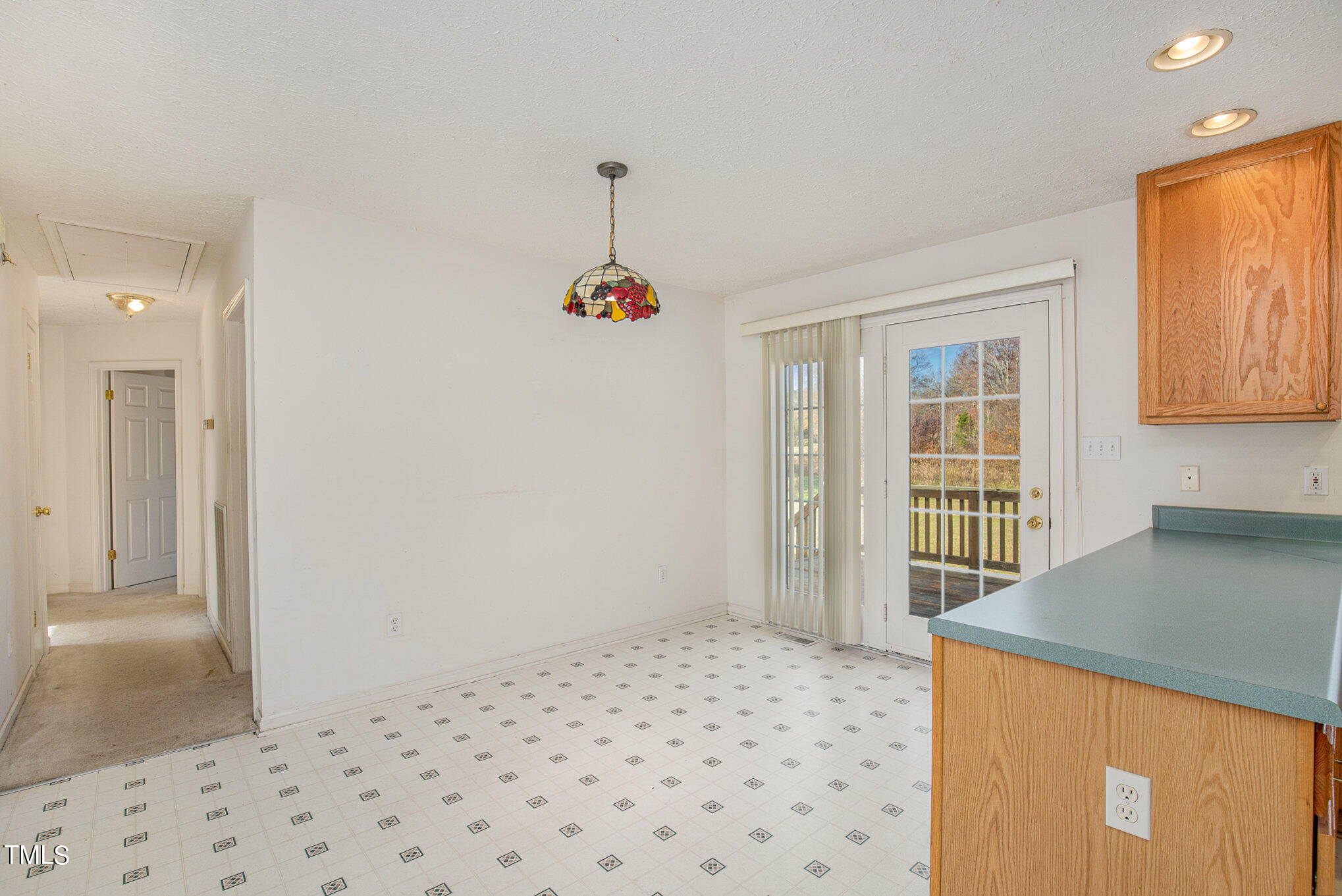 424 Henry Baker Road Zebulon, NC 27597 - Photo 9 of 26 a bedroom with a bed and a window