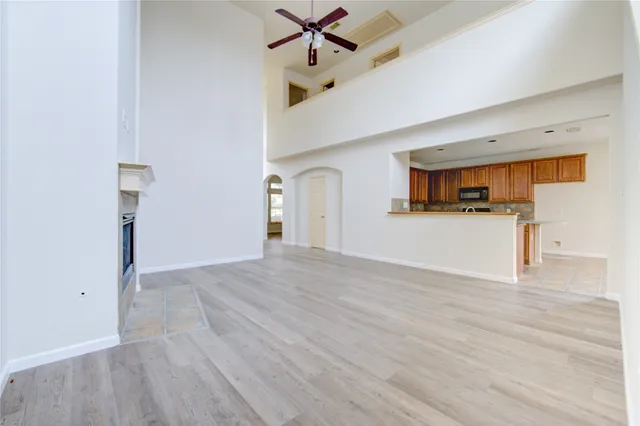 a view of a kitchen with a sink and a window