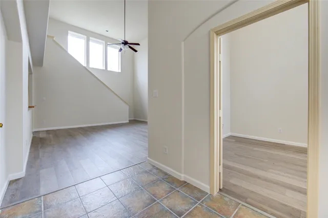 an empty room with windows