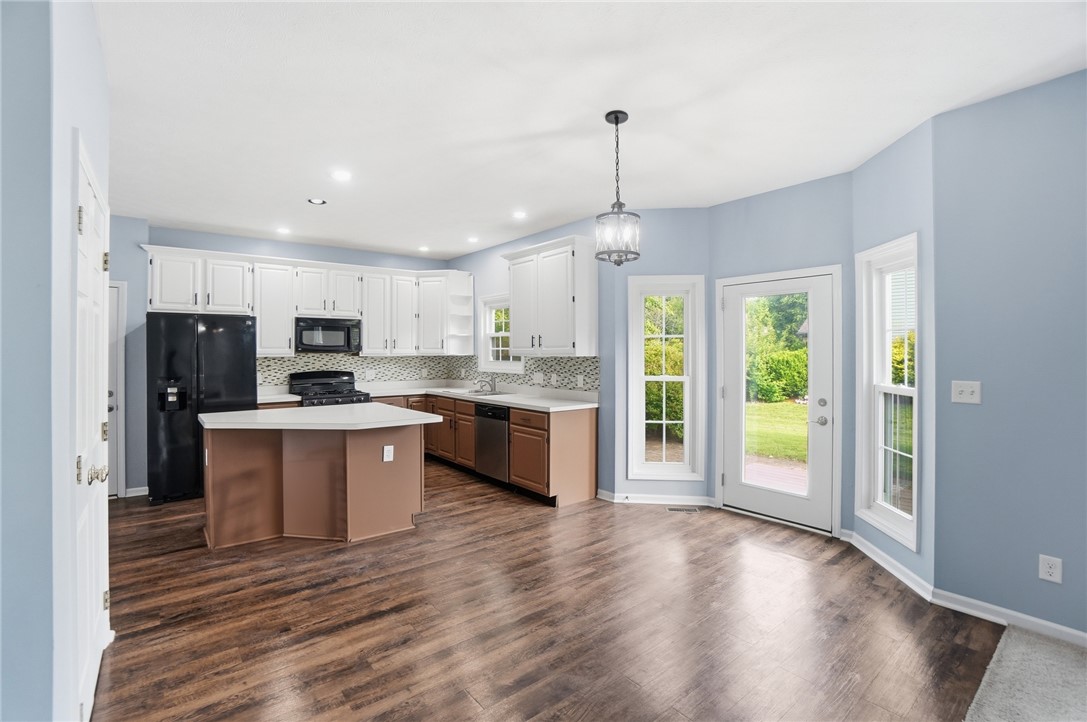 10 Chase Court Springboro, OH 45066 - Photo 17 of 75 This spacious kitchen offers a blend of style and functionality, perfect for everyday living.