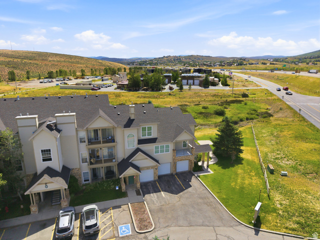 900 Bitner Road, Unit P17 Park City, UT 84098 - Photo 39 of 45 Multi-level residential building featuring covered entryways, stone accents, and private balconies