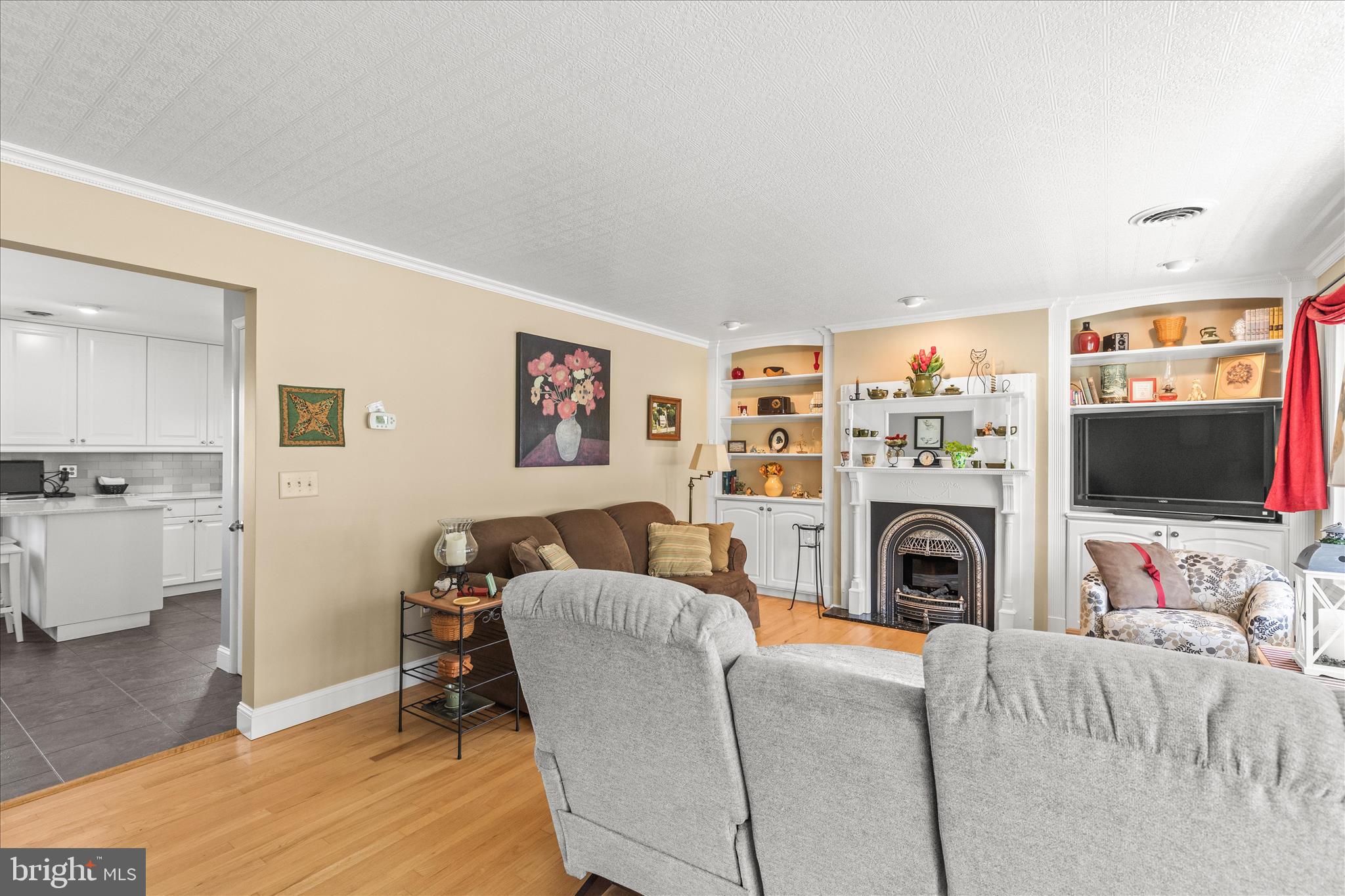 22 Northview Drive Hanover, PA 17331 - Photo 7 of 47 a living room with furniture a flat screen tv and a fireplace