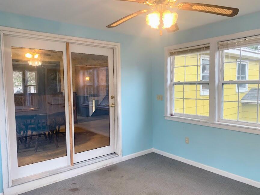 9 Old Post Road Lyman, ME 04002 - Photo 9 of 29 Slider From Sun Room to Dining Area