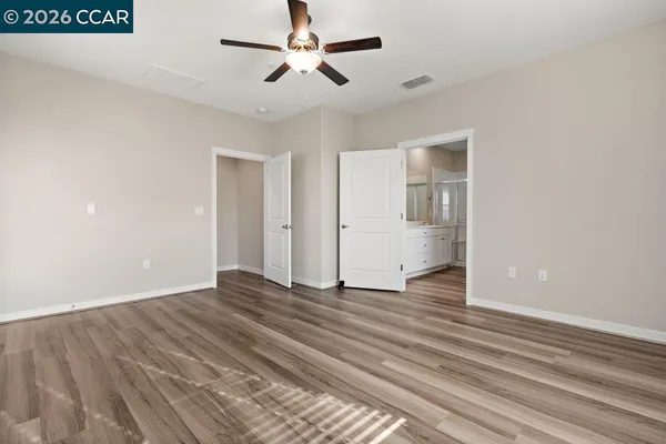 a view of an empty walk in closet