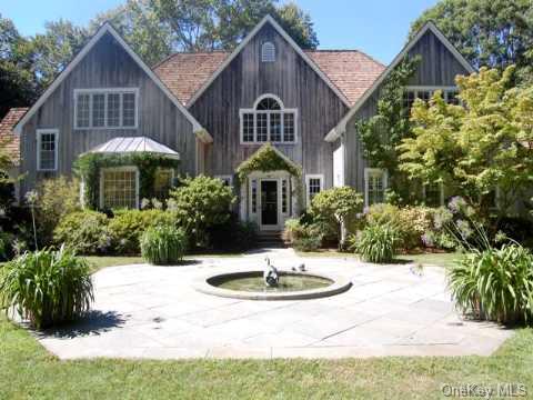 822 Chicken Valley Road Locust Valley, NY 11560 - Photo 1 of 1 a front view of a house with yard