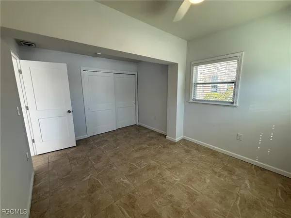 an empty room with windows