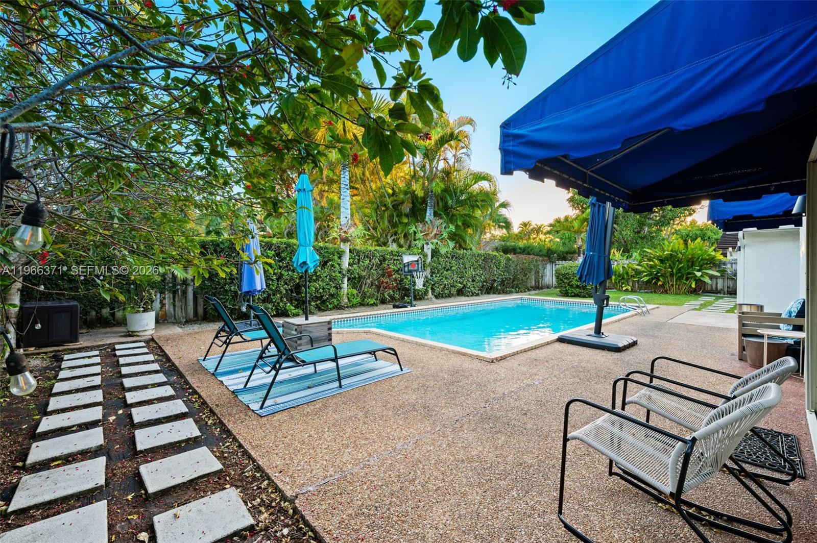 12020 Southwest 93rd Street Miami, FL 33186 - Photo 35 of 42 a view of a patio with a backyard