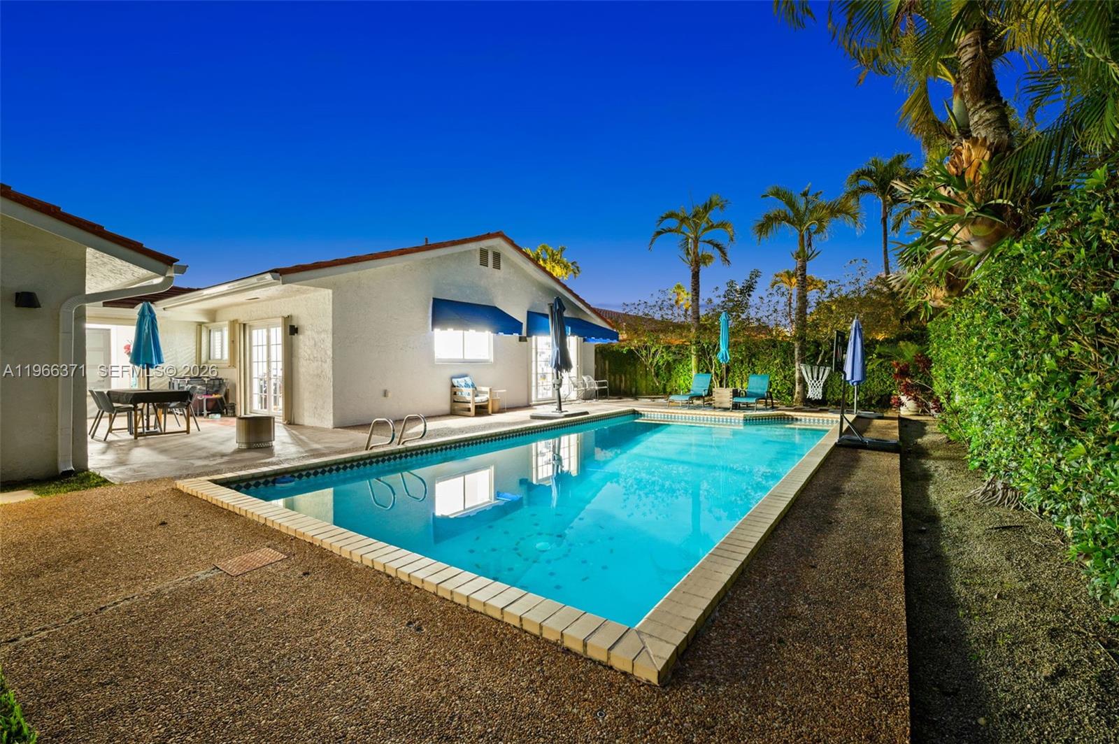 12020 Southwest 93rd Street Miami, FL 33186 - Photo 38 of 42 a view of a house with swimming pool