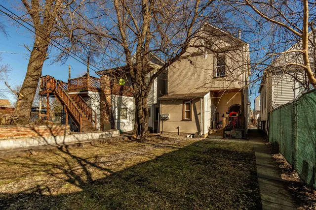 a view of a house with a snow in a yard