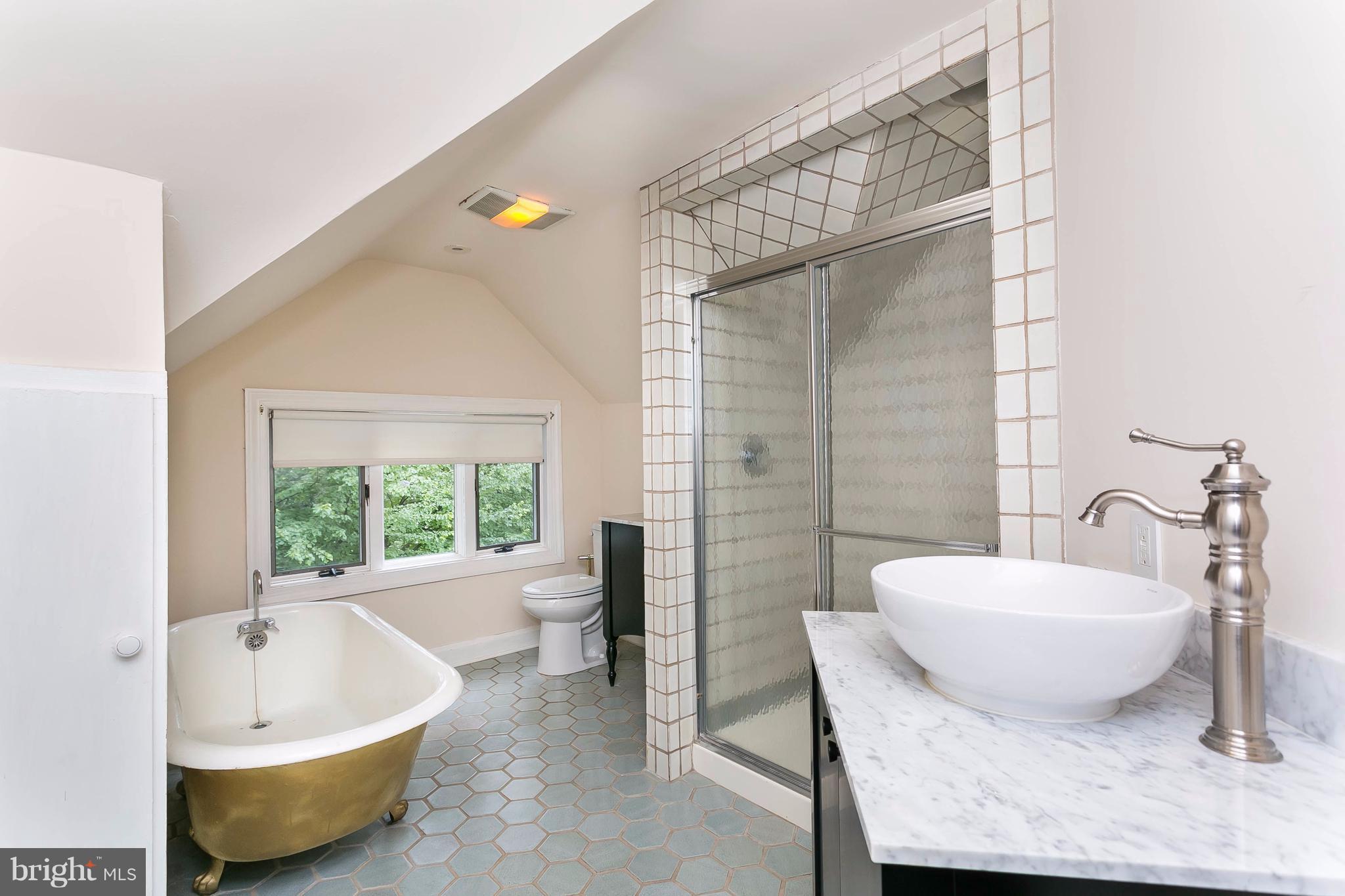 1 Midvale Road Baltimore, MD 21210 - Photo 20 of 30 a spacious bathroom with a tub and shower