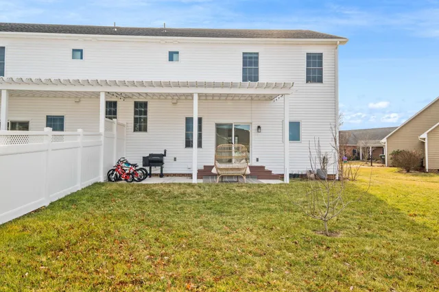 a view of a swimming pool with a lounge chair