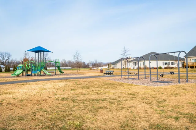 a view of an swimming pool and an outdoor space