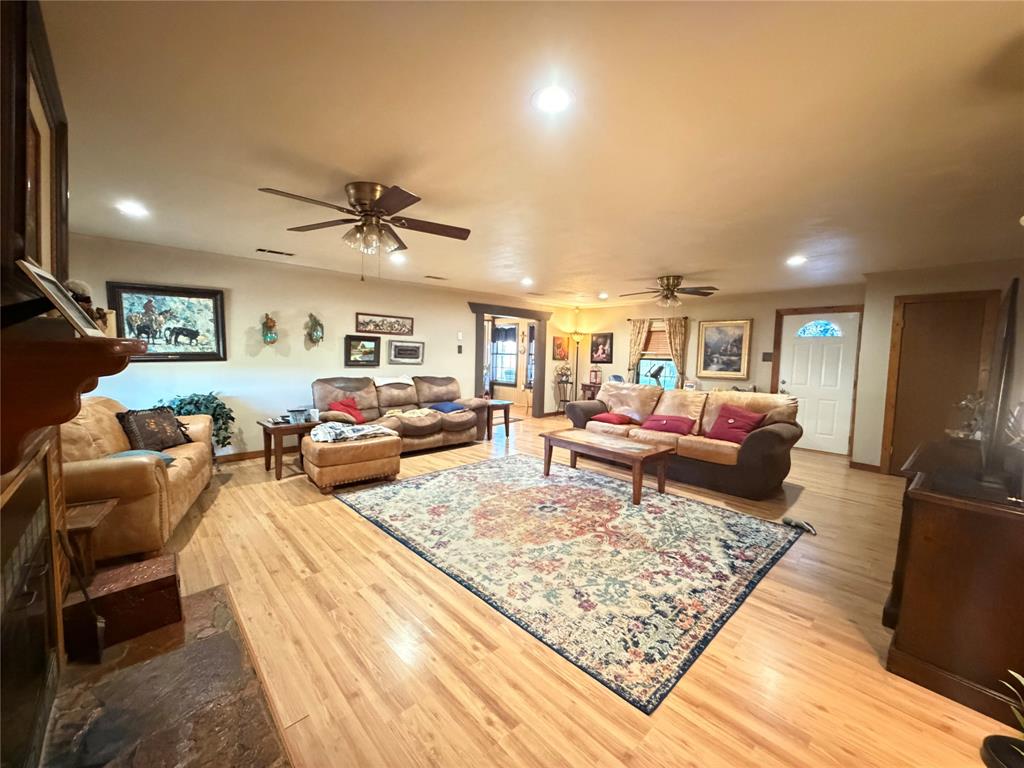 330 South Goode Road Wilmer, TX 75172 - Photo 13 of 38 a living room with furniture and a rug