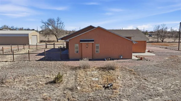 a front view of a house with yard