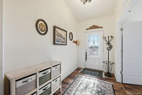 a living room with furniture or couch and a fireplace