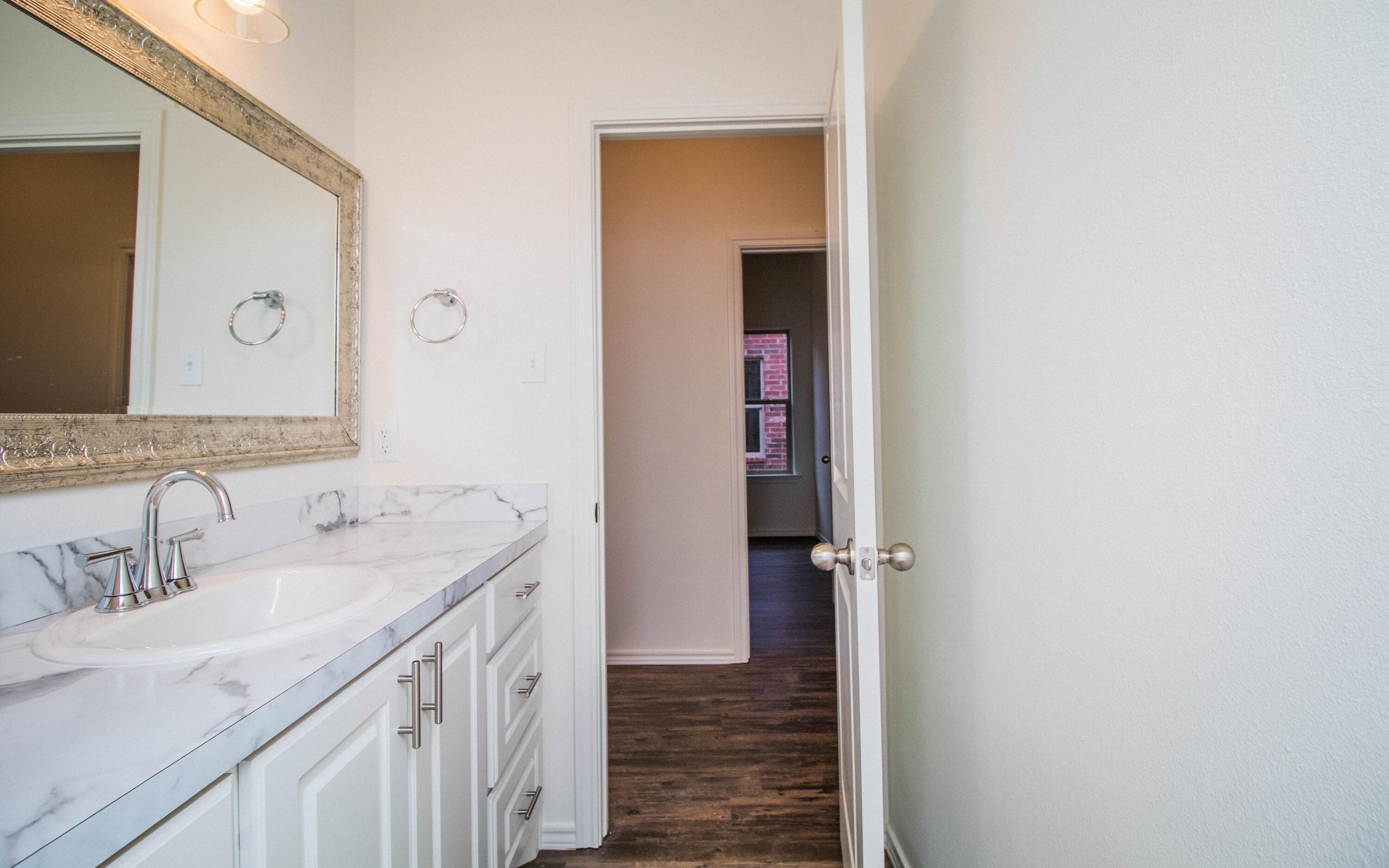 2015 102nd Street Lubbock, TX 79423 - Photo 17 of 24 Hall Bath