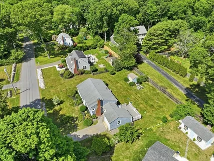 an aerial view of residential house with outdoor space