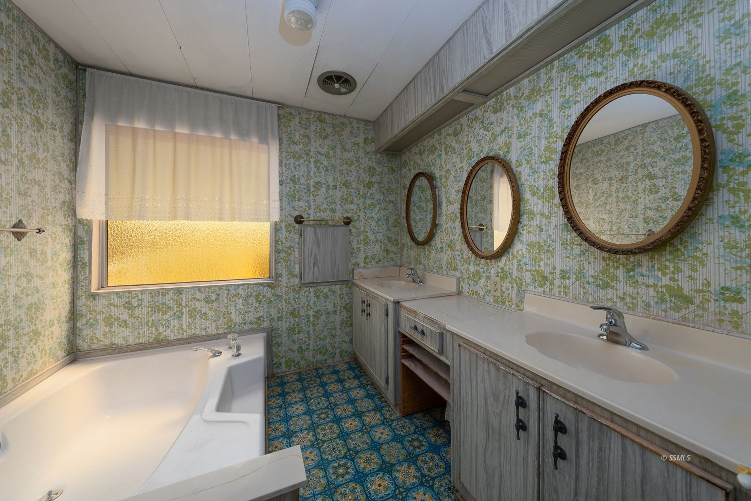 2003 Sydnor Avenue Ridgecrest, CA 93555 - Photo 17 of 35 a bathroom with a sink and a mirror