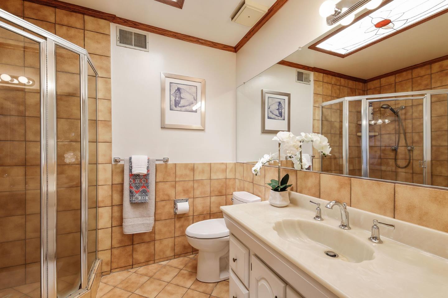 212 Helen Drive Millbrae, CA 94030 - Photo 15 of 24 a bathroom with a sink toilet and shower