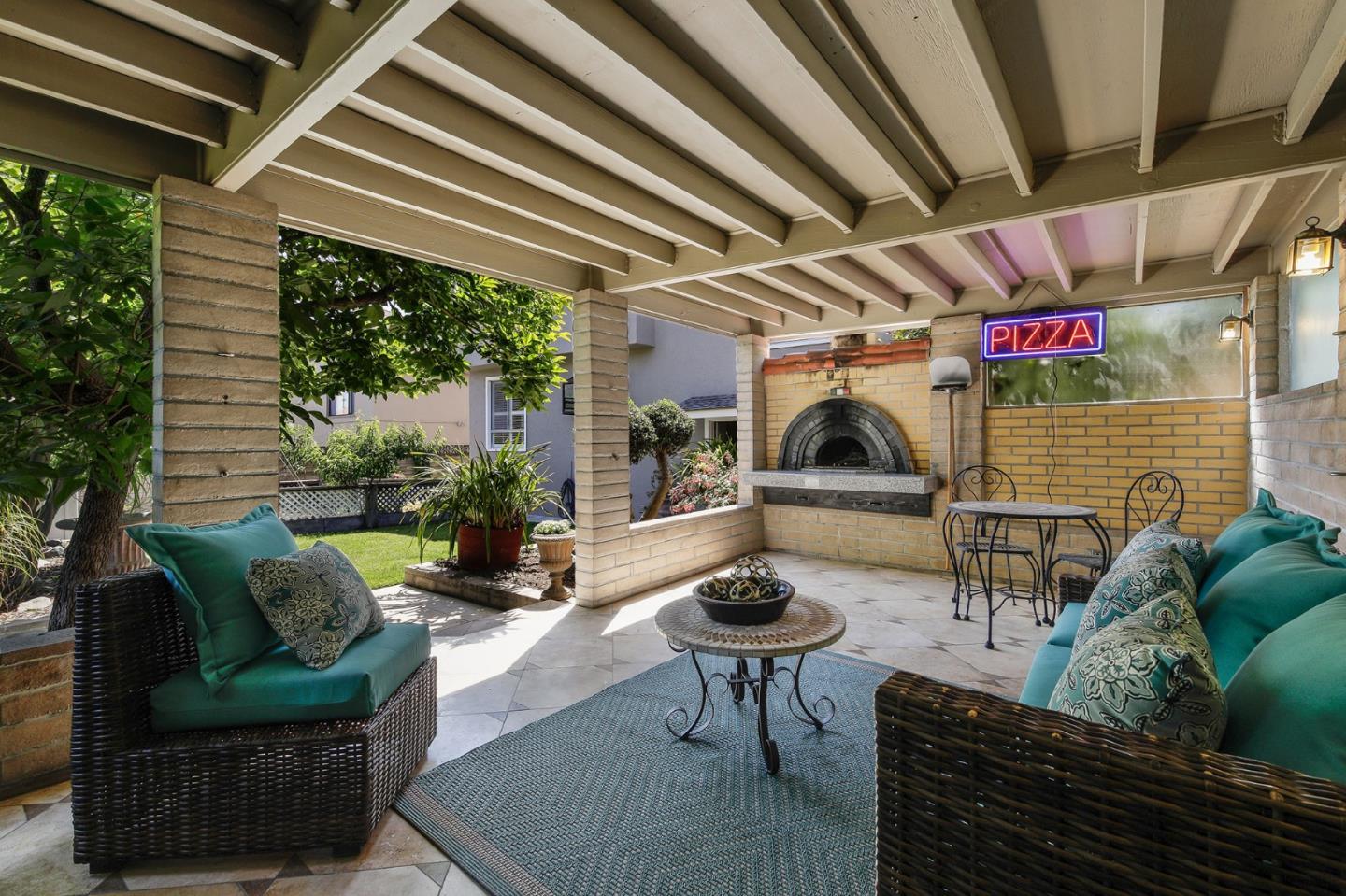 212 Helen Drive Millbrae, CA 94030 - Photo 19 of 24 a outdoor living space with furniture and a rug