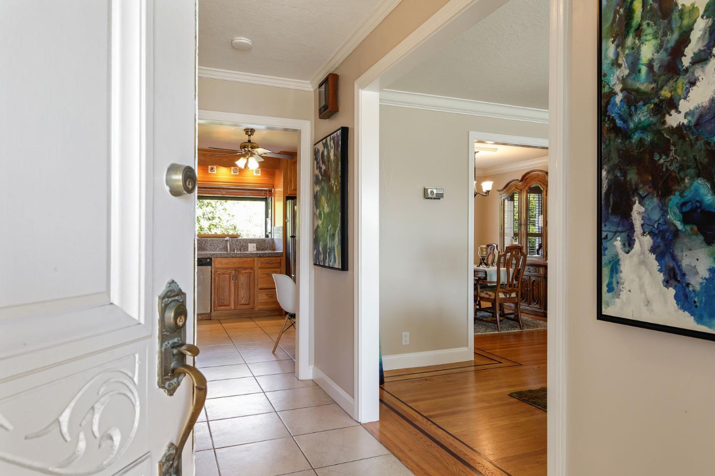 212 Helen Drive Millbrae, CA 94030 - Photo 2 of 24 a view of a hallway and a livingroom with furniture