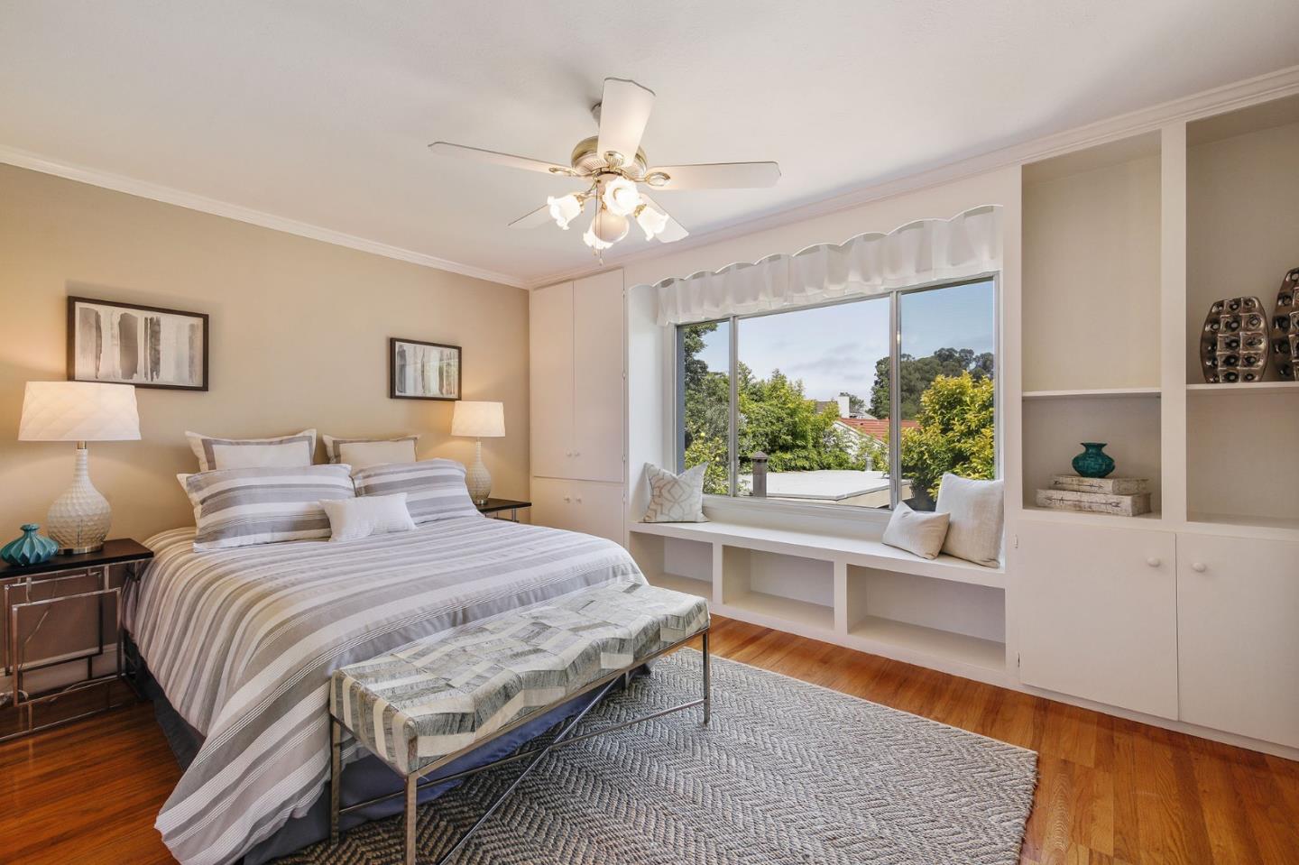 212 Helen Drive Millbrae, CA 94030 - Photo 8 of 24 a bedroom with a large bed and a large window