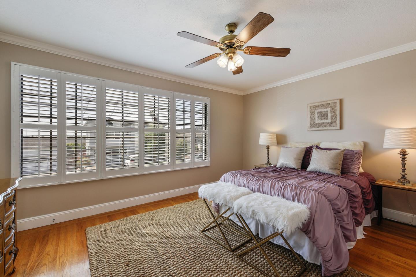 212 Helen Drive Millbrae, CA 94030 - Photo 9 of 24 a spacious bedroom with a large bed and a large window