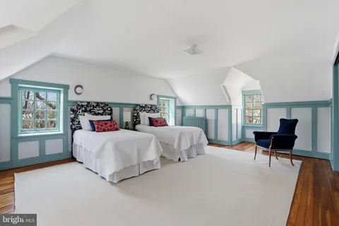 a view of stairs and wooden floor