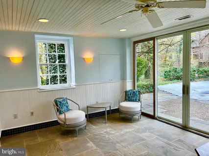 a kitchen with a sink and large window