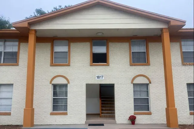 a front view of a house having yard