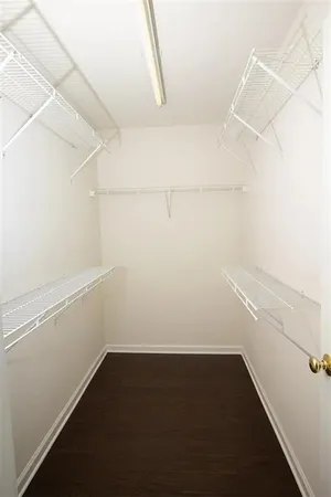 a view of a room with racks on the wall