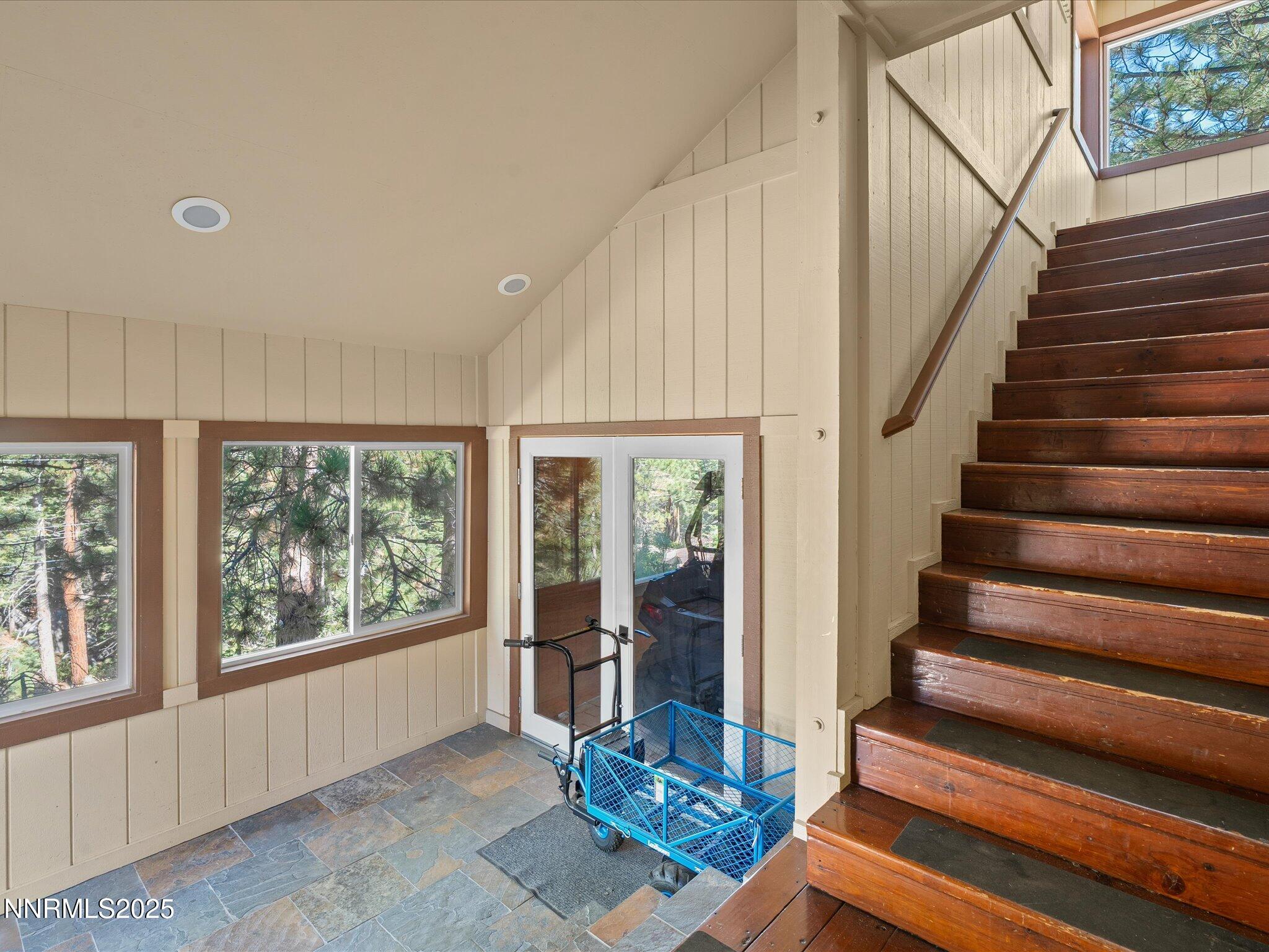 689 Tina Court Stateline, NV 89449 - Photo 15 of 102 a living room with furniture and a floor to ceiling window