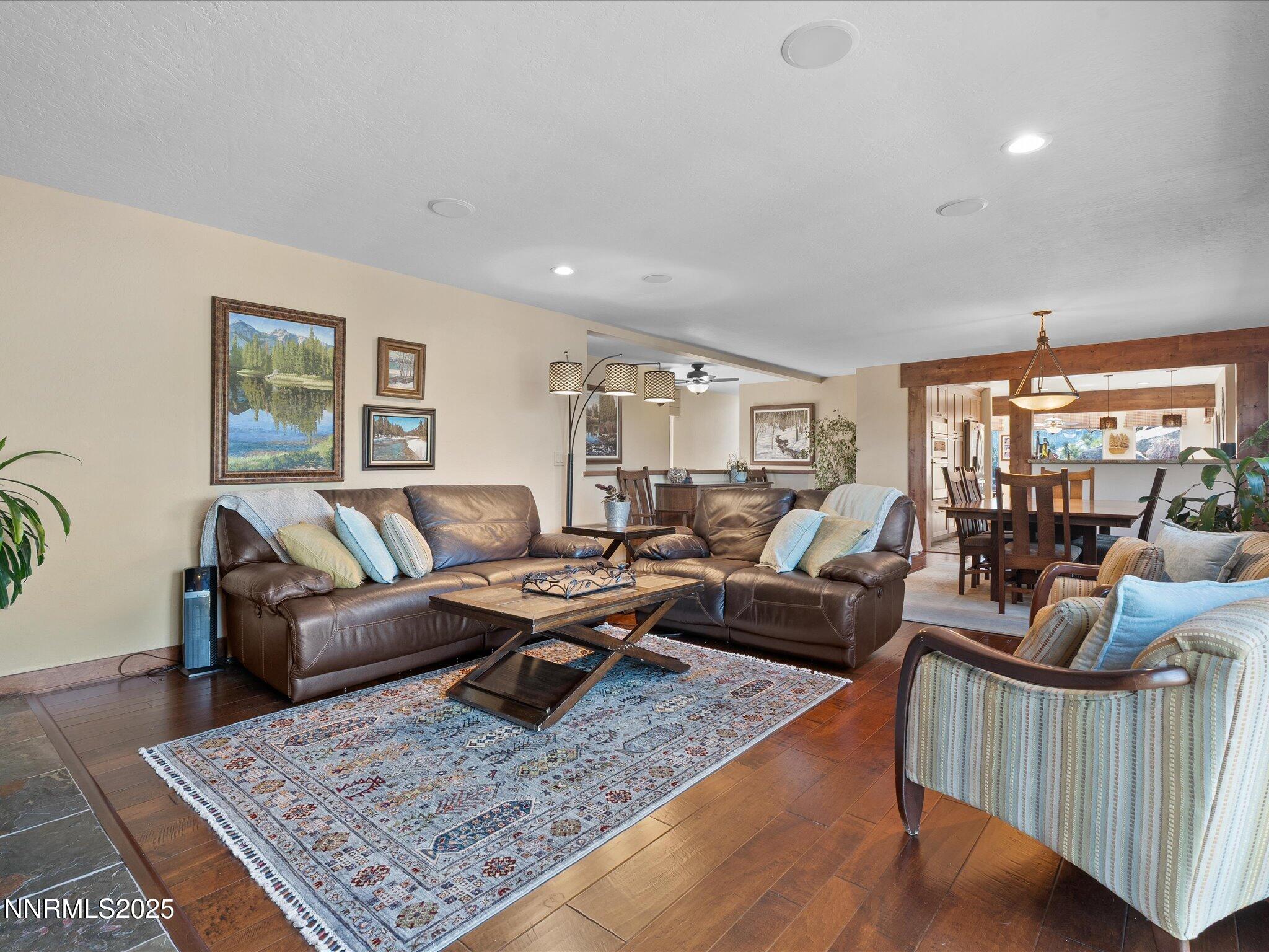 689 Tina Court Stateline, NV 89449 - Photo 20 of 102 a living room with furniture and a rug