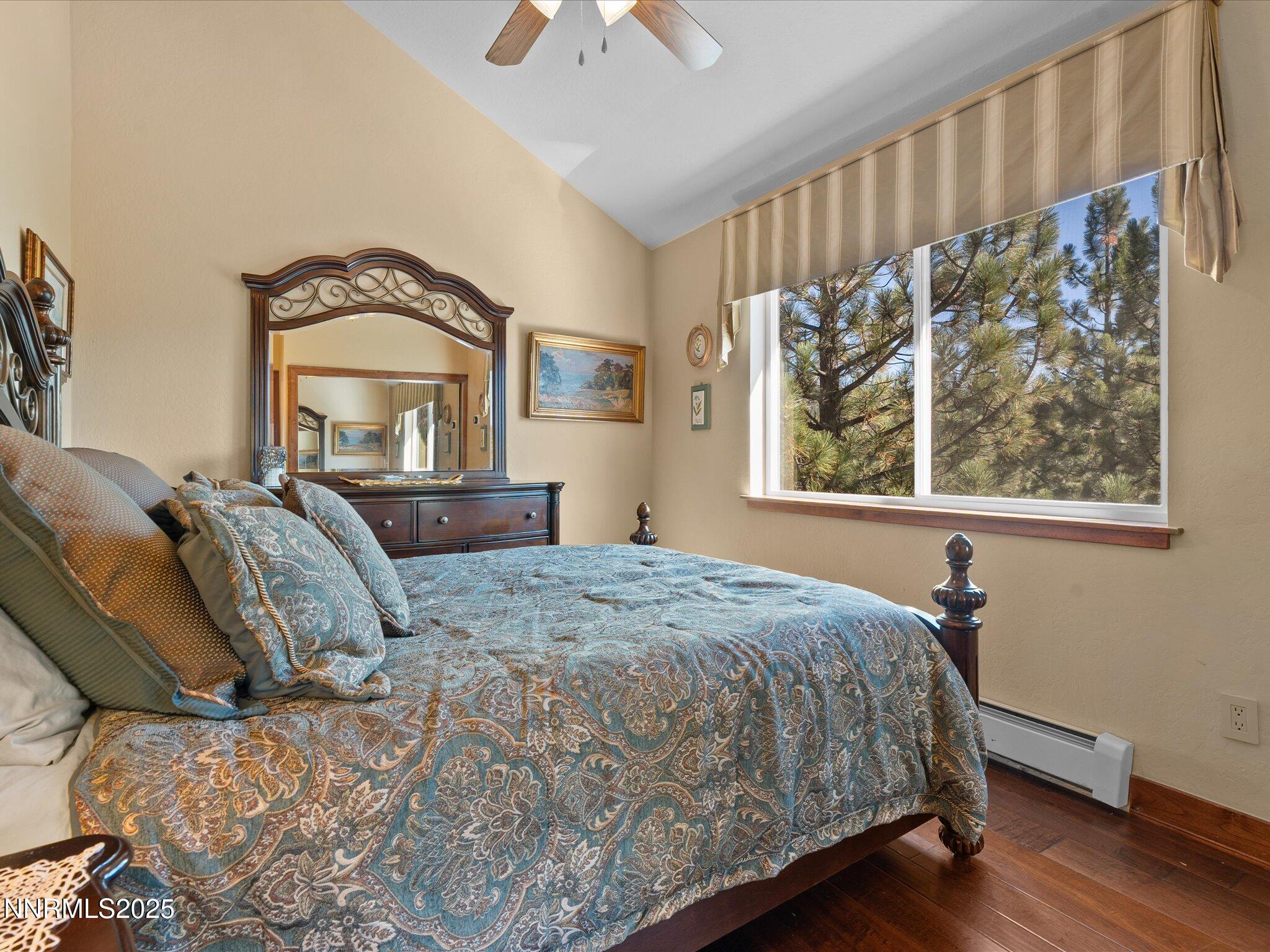 689 Tina Court Stateline, NV 89449 - Photo 50 of 102 a bedroom with a bed and a window