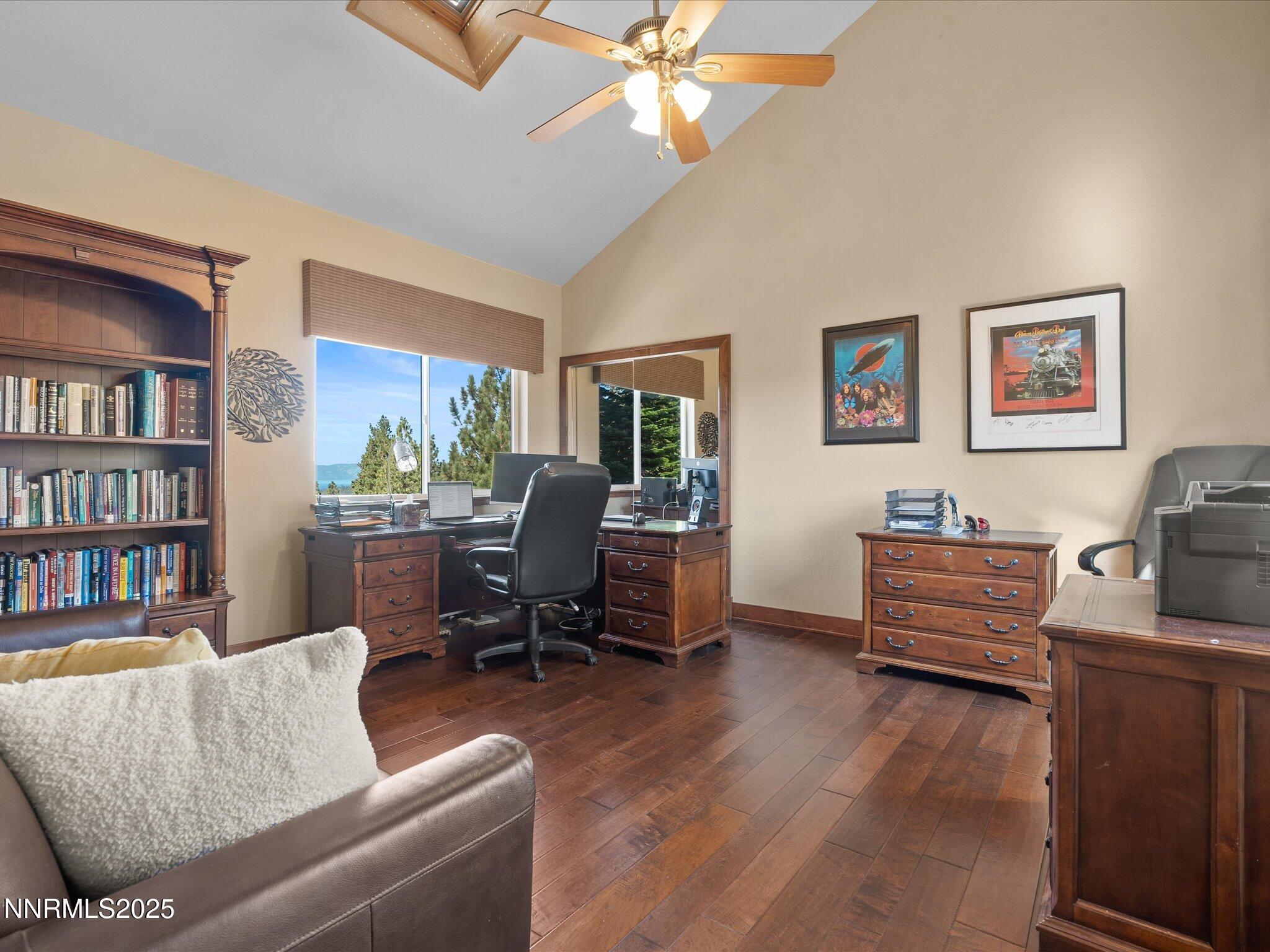 689 Tina Court Stateline, NV 89449 - Photo 53 of 102 a living room with furniture and a bookshelf