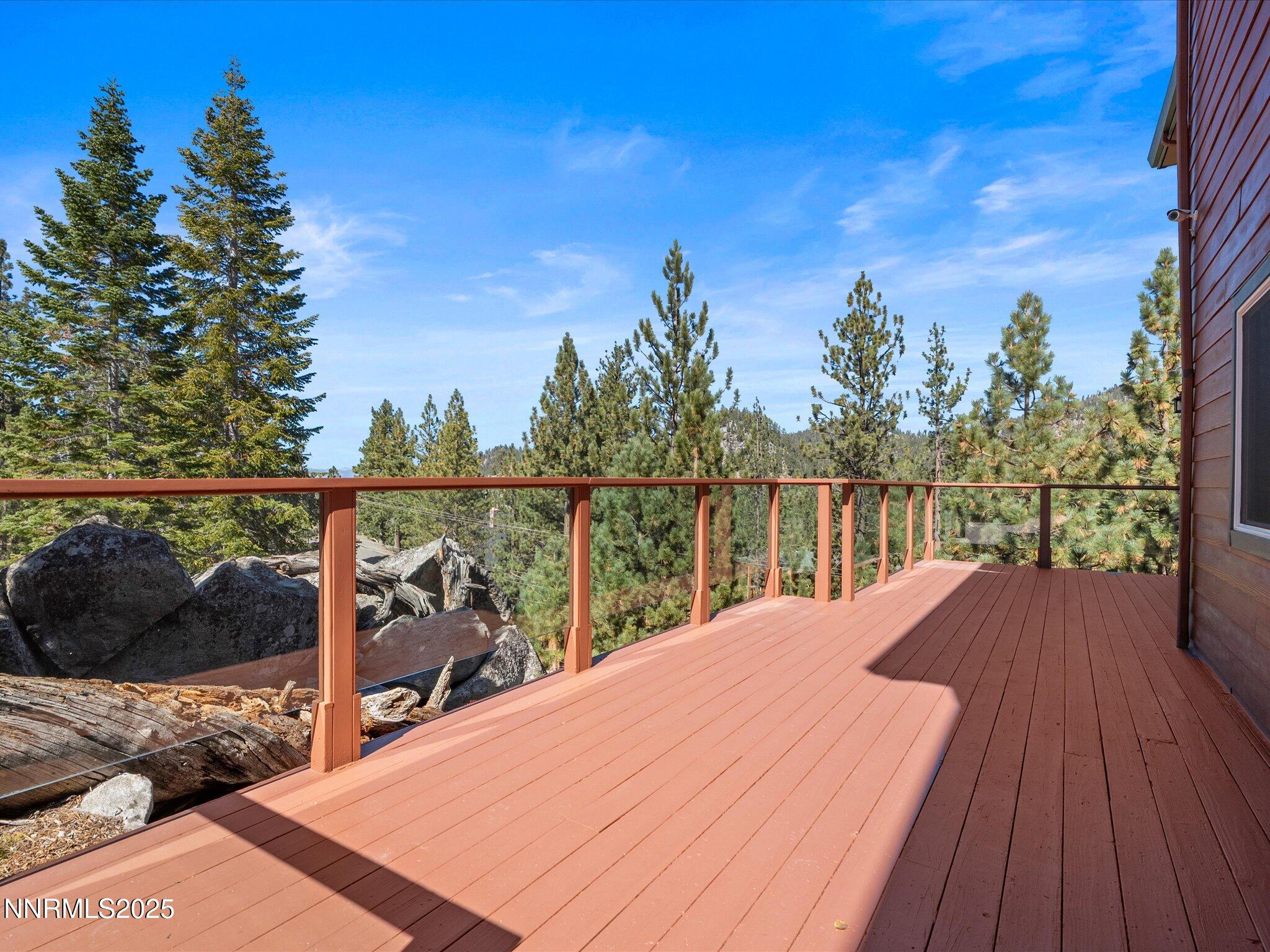 689 Tina Court Stateline, NV 89449 - Photo 60 of 102 a view of a balcony with wooden floor and outdoor space