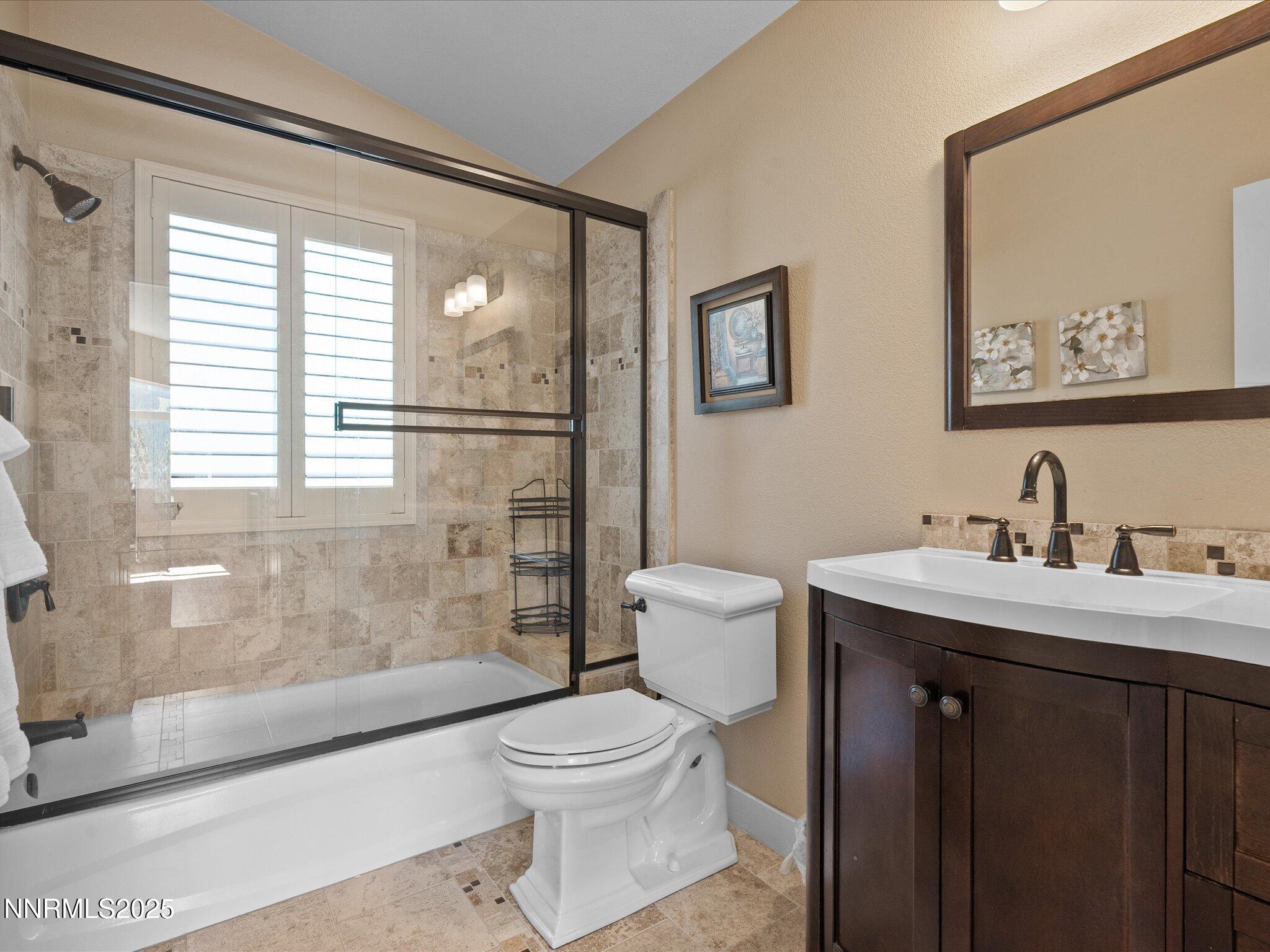 689 Tina Court Stateline, NV 89449 - Photo 81 of 102 a bathroom with a toilet a sink and a bathtub