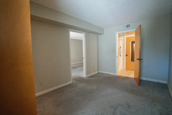 an empty room with windows