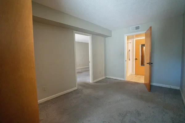 an empty room with windows