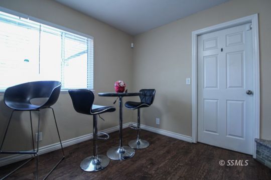 900 North Sierra View Street Ridgecrest, CA 93555 - Photo 15 of 42 a view of a workspace with furniture and a window
