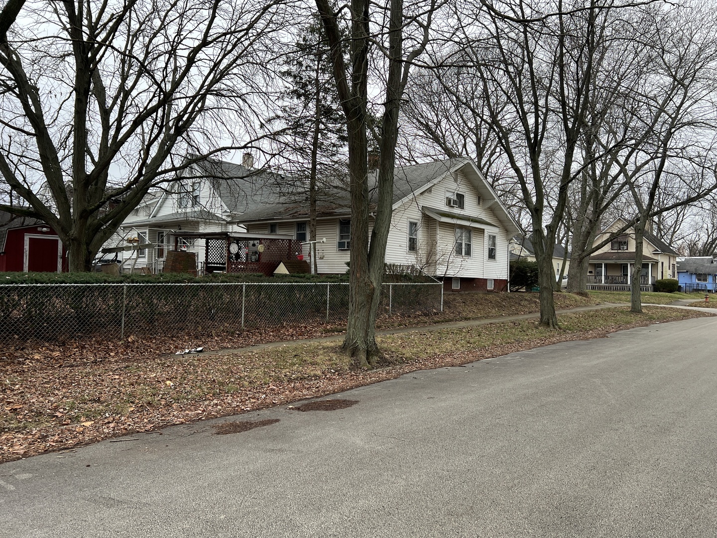1670 North College Street Decatur, IL 62526 - Photo 54 of 56 a front view of a house with a yard